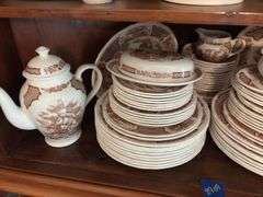 Contents of two shelves: Alfred Meakin Fair Winds pattern brown transfer dinnerware set w/ serving pcs