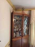 Federal style corner cupboard w/ central eagle finial, glazed top doors over cupboard base, inlaid stringing, French bracket feet - no contents 43x23x94 MUST COME DURING LAST 2 HOURS OF PICKUP FOR THIS ITEM