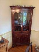 Mahogany corner cupboard w/ molded cornice over glazed doors, drawer and cupboard base, w/ bracket feet - no contents 34.25x17x72 MUST COME DURING LAST 2 HOURS OF PICKUP FOR THIS ITEM