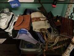 Contents of three shelves: ladies hats and purses, baseball caps,
