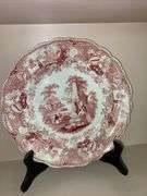 Contents of shelf: red Staffordshire transfer printed plates