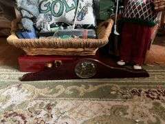 Golf clubs in bag, golfing Santa figure, golf accessories and decor items