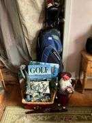 Golf clubs in bag, golfing Santa figure, golf accessories and decor items
