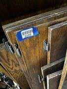 Large workbench (11ft) with doors and shelves, no contents, ***MUST come during last 2 hours of picked up to retrieve this item.