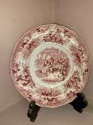 Contents of shelf: red Staffordshire transfer printed plates