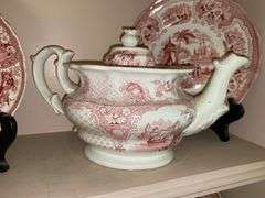 Contents of shelf: red Staffordshire transfer printed china teapot, sugar & creamer, plates