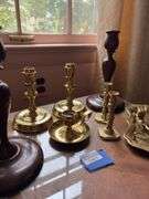 Brass and wood candleholders, wick trimmer on tray