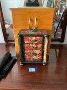 Floral decorated jewelry box and oak jewelry cabinet