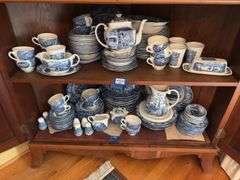 Contents of two shelves: Liberty Blue Historic Colonial Scenes dinnerware set w/ serving pcs