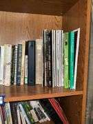 Book contents of four shelves: Bibles, golf, reference, misc