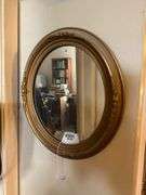 Wall hangings: oval gilt mirror 18x16, and bisque plaque w/ figures in relief