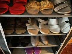 Shoe storage rack w/ ladies shoes/sandals