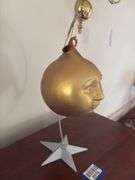 Man-in-the-Moon ornament on stand