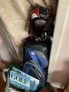 Golf clubs in bag, golfing Santa figure, golf accessories and decor items