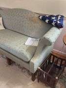 Camel back sofa and throw pillows - note upholstery shows wear - flag not included 72in long