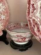 Contents of shelf: red Staffordshire transfer printed platter and plates, including British Lakes pattern