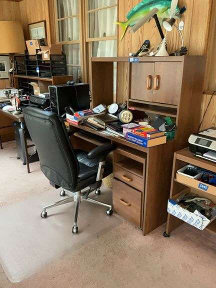 Computer desk and black swivel chair and all contents: calculators, keyboard, clock, desk lights, misc 53x24x53