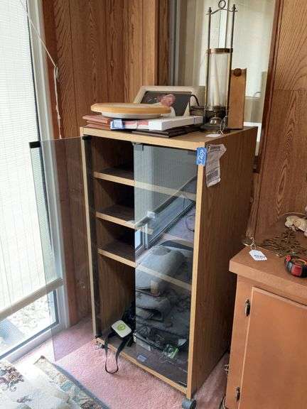 Rolling glass door cabinet w/ top contents - no interior contents 23x19x46