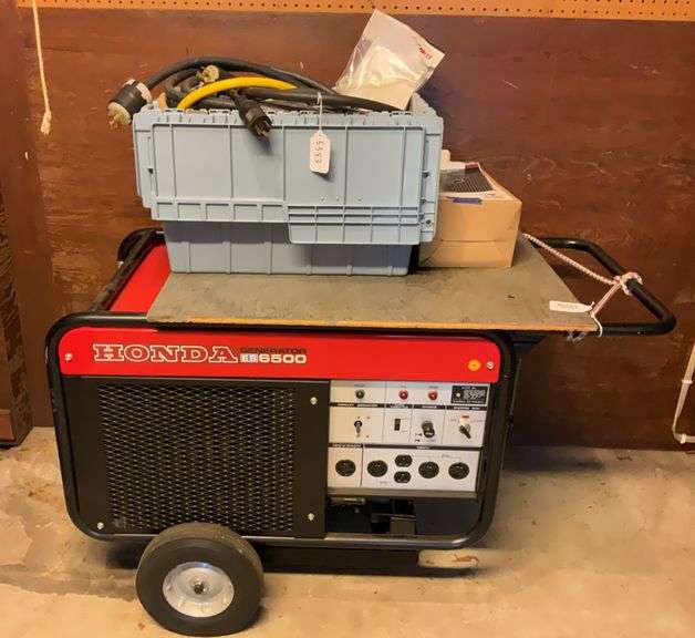 Honda ES6500 generator w/ owner's manual, and extension cords