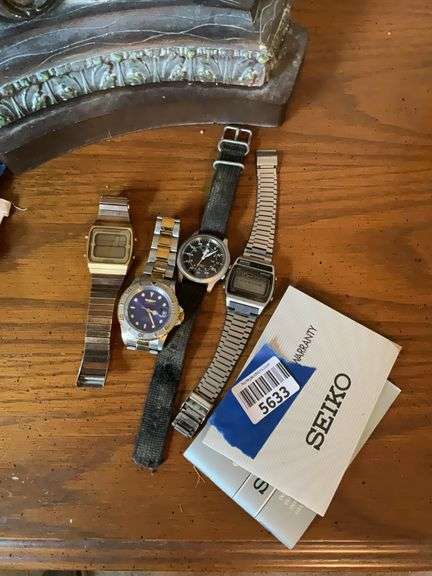 Men's wrist watches including: Seiko, Invicta,