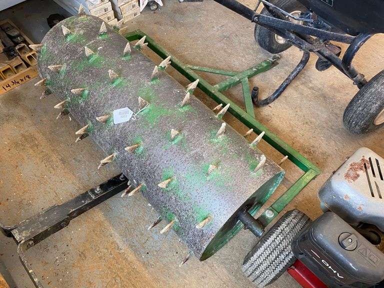 Pull behind lawn spike aerator