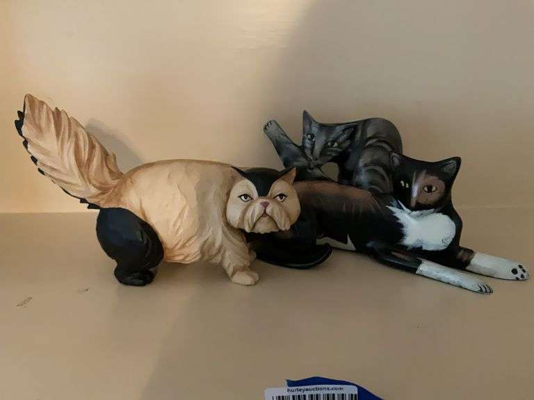 Three cat figures w/ different personalities