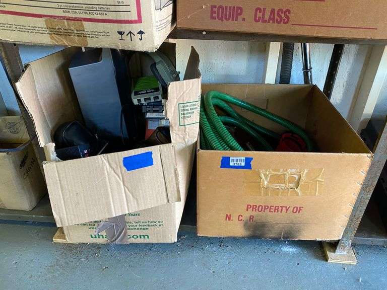 Contents of shelf: 8-track tapes, hose, misc
