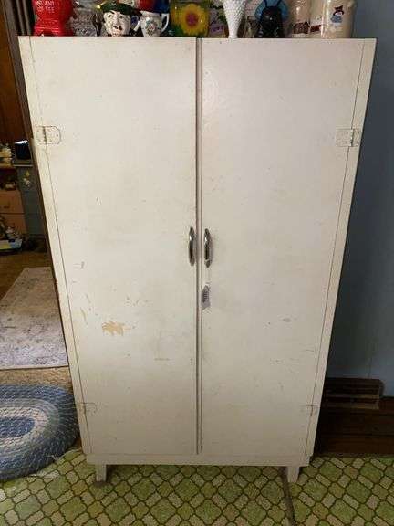 White storage cabinet - no contents 30.5x16x55 - MUST COME DURING LAST 2 HOURS OF PICKUP FOR THIS ITEM