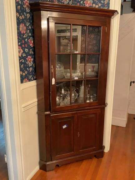 Corner cupboard w/ molded cornice, glazed top door over paneled door base, bracket feet - no contents 39x18x73.5 - MUST COME DURING LAST 2 HOURS OF PICK UP FOR THIS ITEM