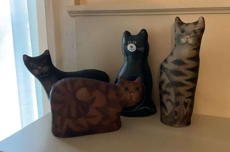 Four canvas cat figures