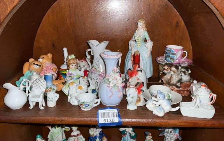 Contents of shelf: animal and people figurines, china miniatures, dragonware cup & saucer