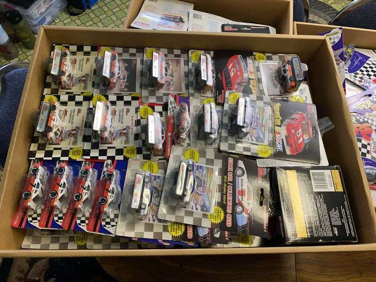 Nascar Racing Champions and Matchbox car models, in packages