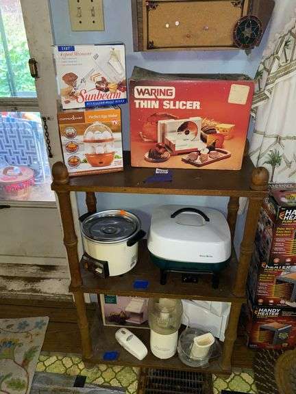 Shelf unit and small appliance contents: electric skillet, slicer, hand mixer, egg maker, rice cooker, ice crusher, processor, toasters24x37x12