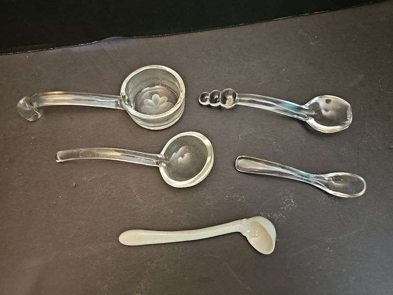 Five condiment spoons - Four glass & one porcelain