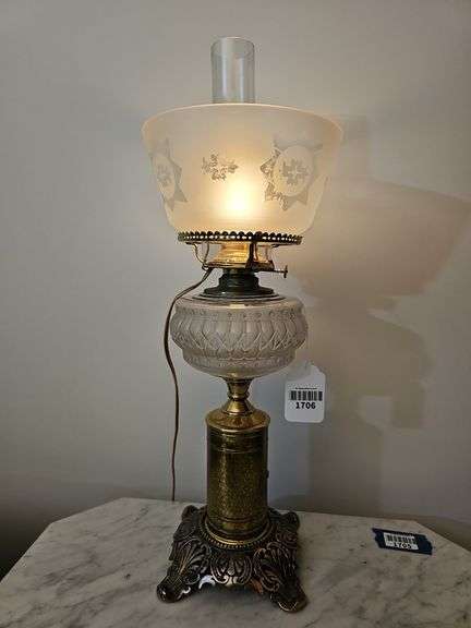 Composite stand oil lamp w/ embossed brass column, frosted glass font, etched shade, w/ electric burner 23 in H