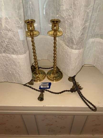 Pair of spiral stem candlesticks, and string of bells of Sarna