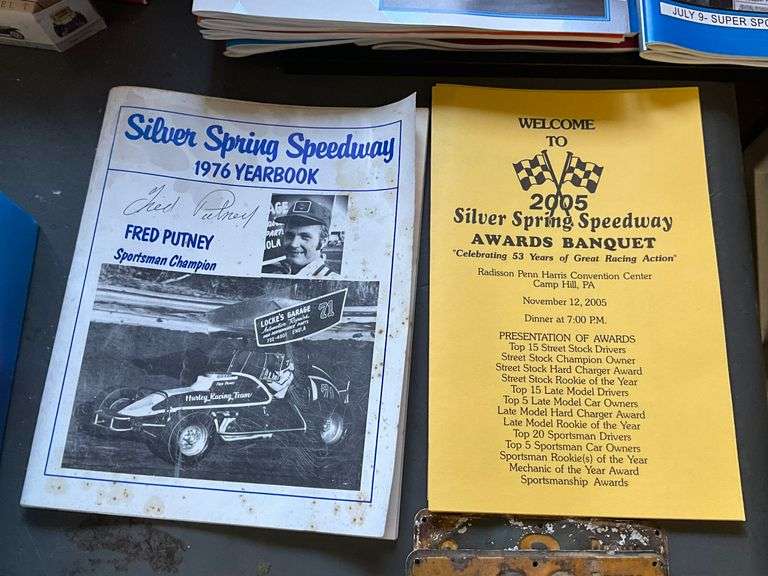 Silver Spring Speedway yearbooks, photograph, 2005 Awards Banquet program, and plastic cups