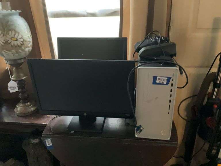 HP desktop computer, two monitors, speakers