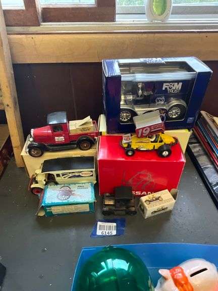 Auto models including banks and pencil sharpener