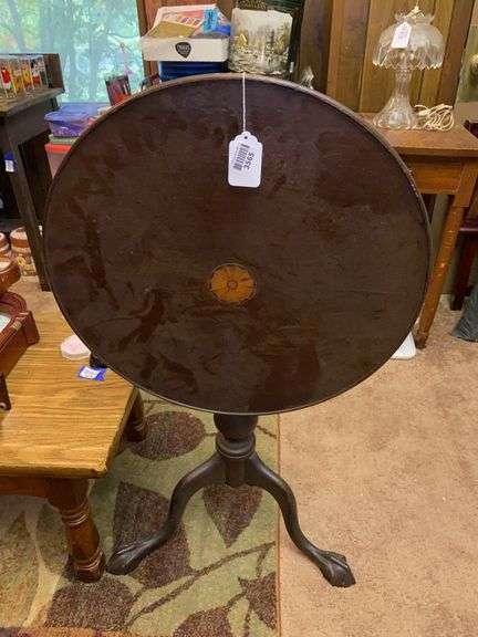 Chippendale tilt-top tea table, round top w/ inlaid marquetry rosette, turned column on tripod base w/ claw & ball feet