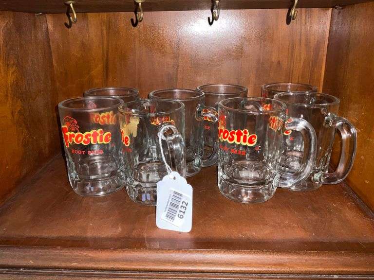 Contents of shelf: Frostie Root Beer glass mugs