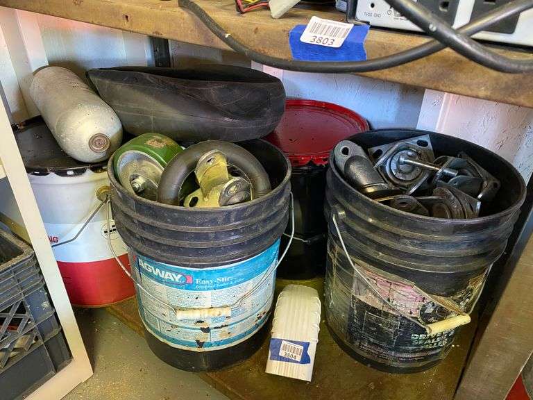 Contents of shelf: buckets and misc