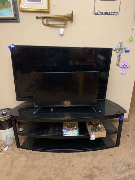 Westinghouse TV model: WD32HB1120-C, Philips TV model: 50PFL5601/F7, and TV Stand - flatware not included 54x20x19.5