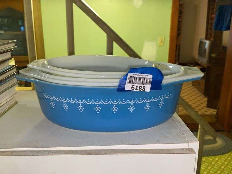 Vintage Pyrex Snowflake Garland oval casserole and two milk glass patterned lids