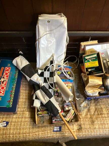 Diecast miniature race cars, checkered flag, misc