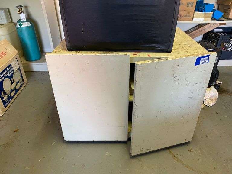 White cabinet and printer paper contents - no top contents