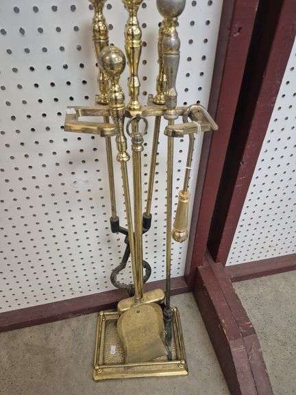 Brass tone fireplace tools on rack - Hurley Real Estate & Auctions