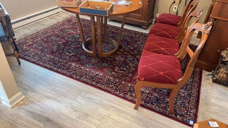 Persian style rug with red ground 9ft 6in x 5ft 9in