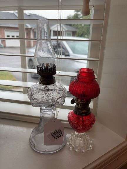 Two miniature glass oil lamps: roses stand lamp, and red stained with matching chimney shade