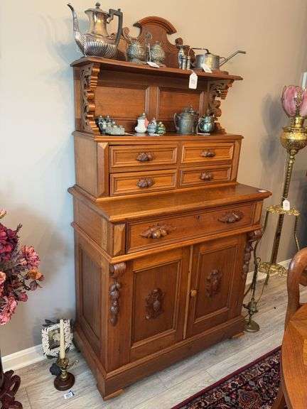 Victorian Renaissance Revival parlor cabinet with sawn shelf supports, paneled base doors with carved shields, fruit carved drawer pulls - no contents 37x19x72 - MUST COME DURING LAST 2 HOURS OF PICKUP FOR THIS ITEM